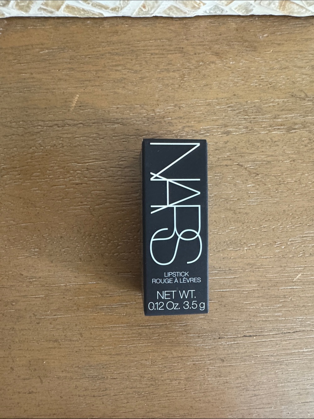 NARS Lipstick Packaging in Black with White Logo